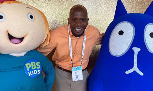 James Abraham with PBS KIDS characters Peg + Cat